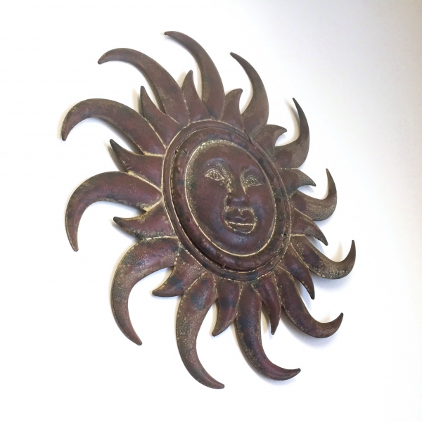 Kovová dekorace na zeď slunce