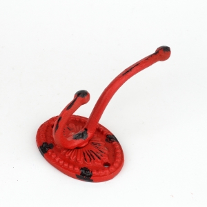 Litinový retro věšák na kabáty oválný červený