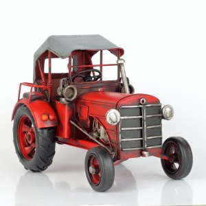Model traktoru červený plech 25cm