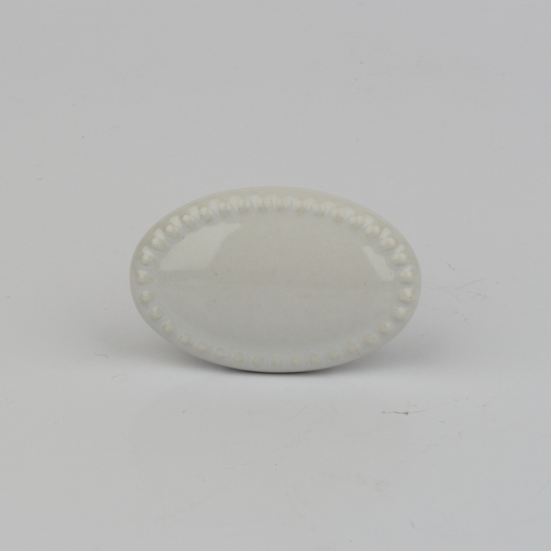 Nábytková úchytka keramická bílý ovál 4x3cm