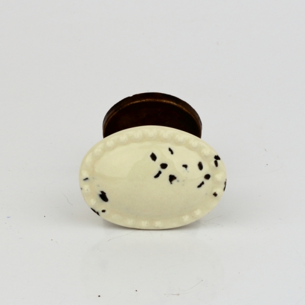 Nábytková úchytka oválná oprýskaný vzhled 4cm