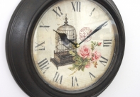 Nástěnné kovové hodiny ptačí klec 29cm