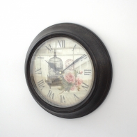 Nástěnné kovové hodiny ptačí klec 29cm