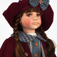 Porcelánová panenka 1228 v rezavém svetříku