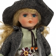 Porcelánová panenka v černobílém kabátku 20cm