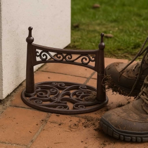 Škrabák na boty litinový s ornamenty